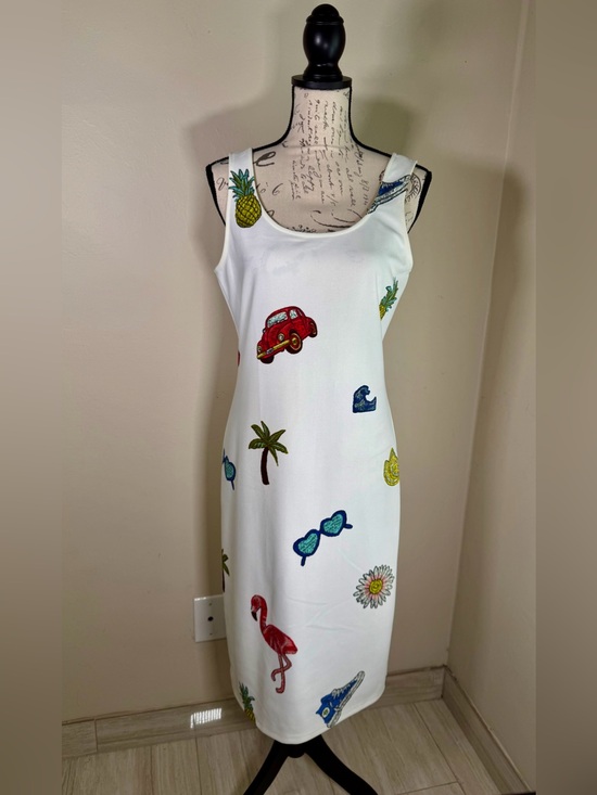 Nicole Miller Dresses & Skirts - Nicole Miller White Sleeveless High-Low Dress with Multicolor Summer Motifs